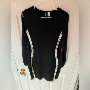 H&M long sleeve mini. Never worn. Size 14